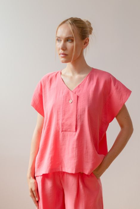 BLUSA ROSA CIERRE BOTÓN PAN PRODUCTO BÁSICO